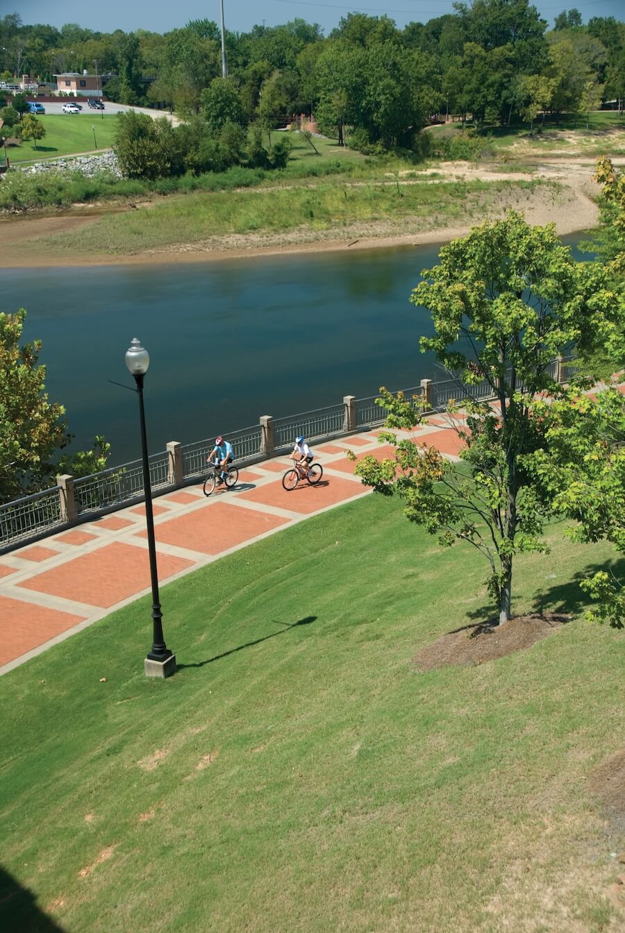 Cyclists riding the Riverwalk trail in Columbus Georgia